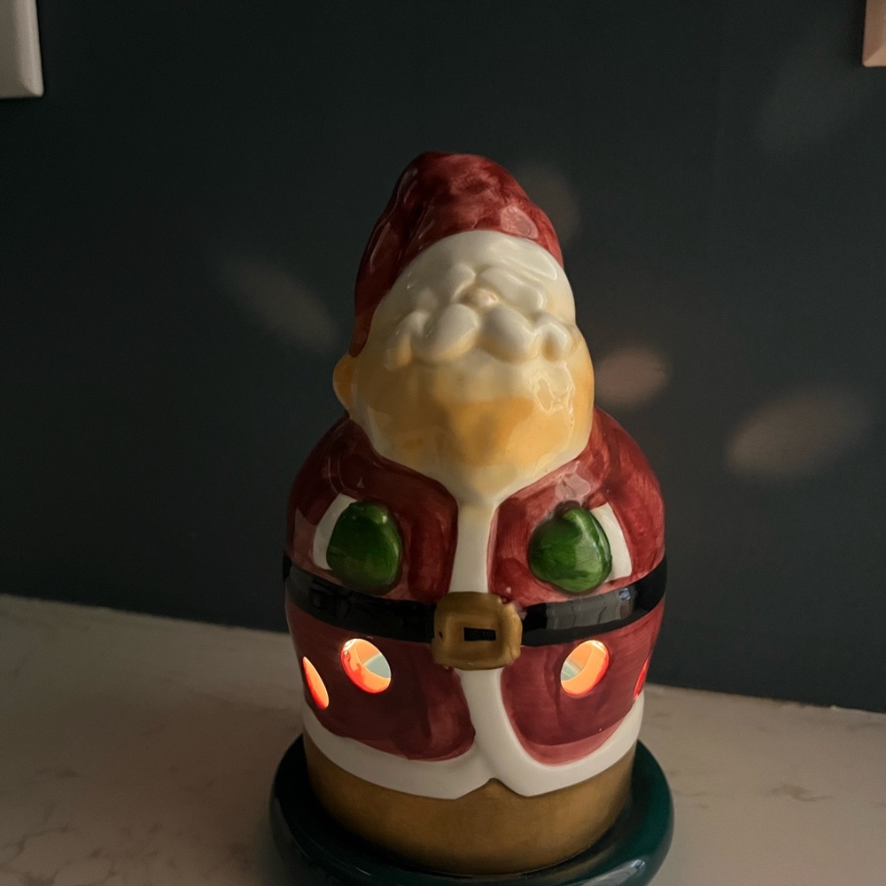 7 inch tall Santa candle holder